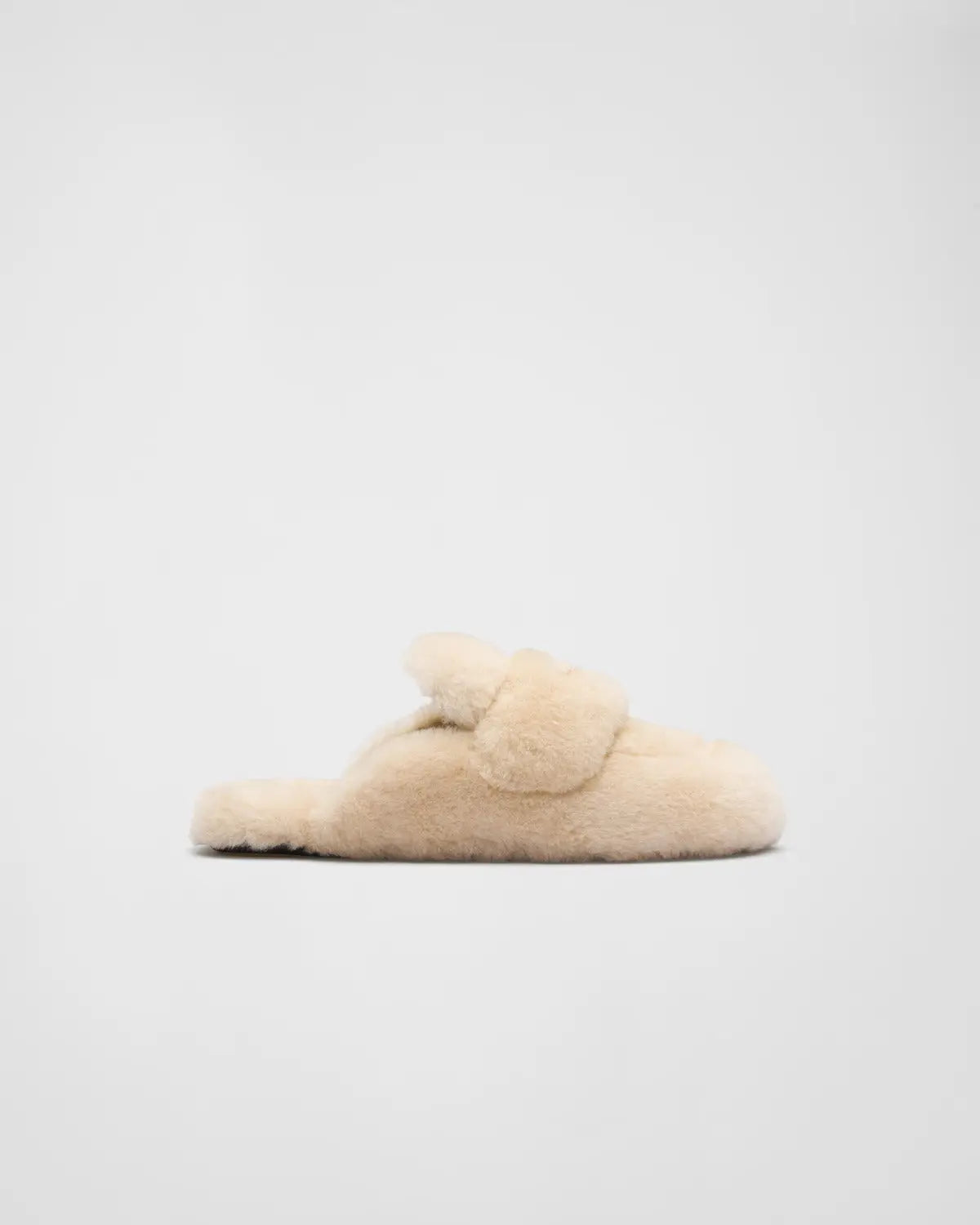 Shearling mules – the soft feel of shearling emphasizes the winter aesthetic of the style – LUX VERSE Luxury Designer Fashion Outlet