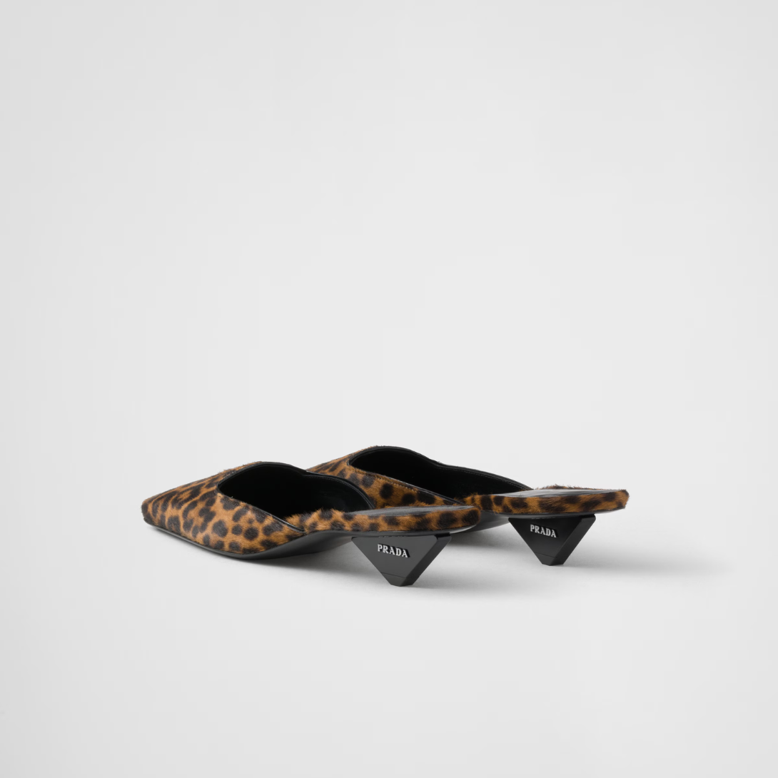 Printed leather slides – modernist lines and architectural volumes define the silhouette of these leather – LUX VERSE Luxury Designer Fashion Outlet