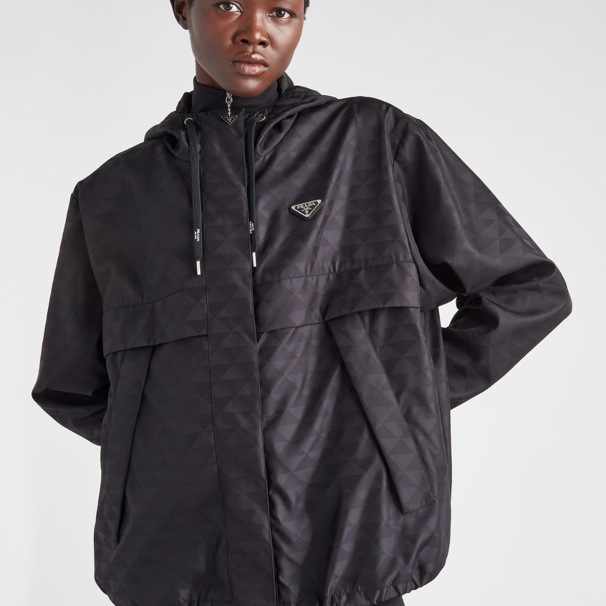 Printed Re-Nylon jacket – here, the geometric design is transformed into a sophisticated yet modernist pattern – LUX VERSE Luxury Designer Fashion Outlet