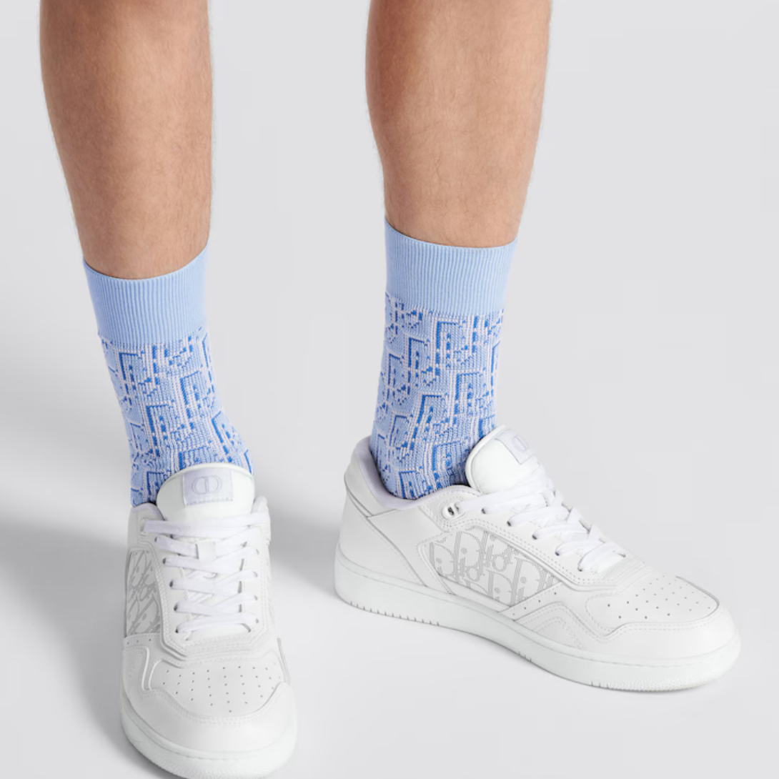 B27 Low-Top Sneaker White – crafted in white smooth calfskin, the style is adorned with white Oblique Galaxy – LUX VERSE Luxury Designer Fashion Outlet