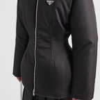Re-Nylon down iconic jacket – padded with goose down, the garment is decorated with the iconic enameled metal – LUX VERSE Luxury Designer Fashion Outlet