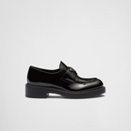 patent leather loafers – leather band on the upper Apron with stitched, raised edge Enameled metal triangle – LUX VERSE Luxury Designer Fashion Outlet