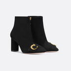 C'est Heeled Ankle Boot Black – crafted in black suede calfskin, the streamlined style is enhanced by gold-finish – LUX VERSE Luxury Designer Fashion Outlet