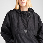 Printed Re-Nylon raincoat – technical details define this timeless style while the enameled metal triangle logo – LUX VERSE Luxury Designer Fashion Outlet