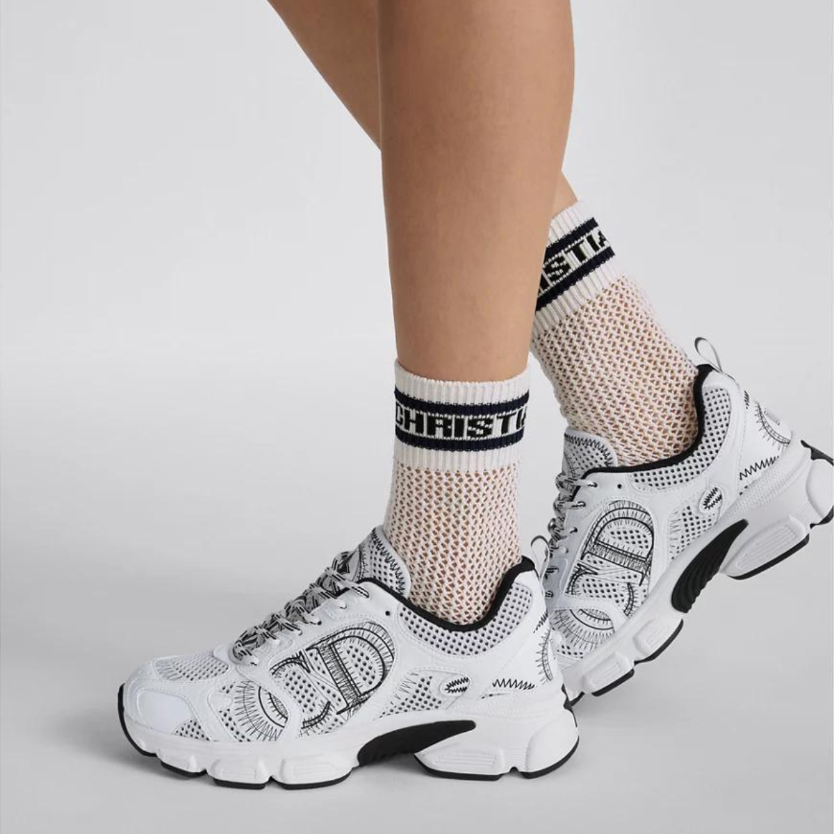 Chrono Sneaker Leather – pairing mesh with white and black leather-effect panels, it is accented by hallmark – LUX VERSE Luxury Designer Fashion Outlet
