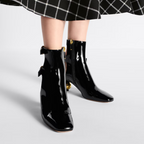 D-Idole Heeled Ankle Boot – the black patent calfskin upper is elevated by an open-back design showcasing – LUX VERSE Luxury Designer Fashion Outlet