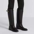 Empreinte Boot – constructed in black brushed calfskin, the silhouette is accented by the gold-finish – LUX VERSE Luxury Designer Fashion Outlet