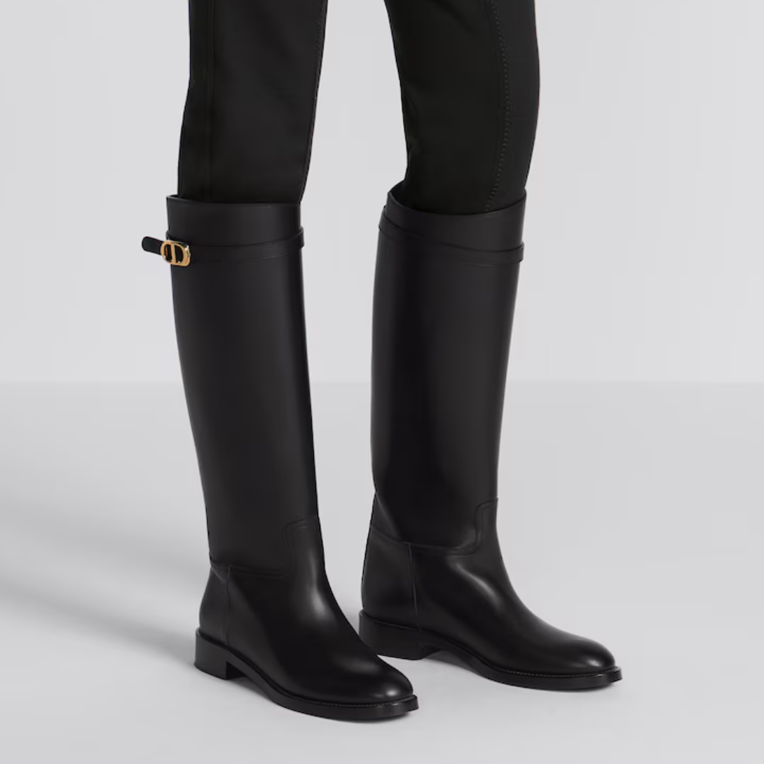 Empreinte Boot – constructed in black brushed calfskin, the silhouette is accented by the gold-finish – LUX VERSE Luxury Designer Fashion Outlet