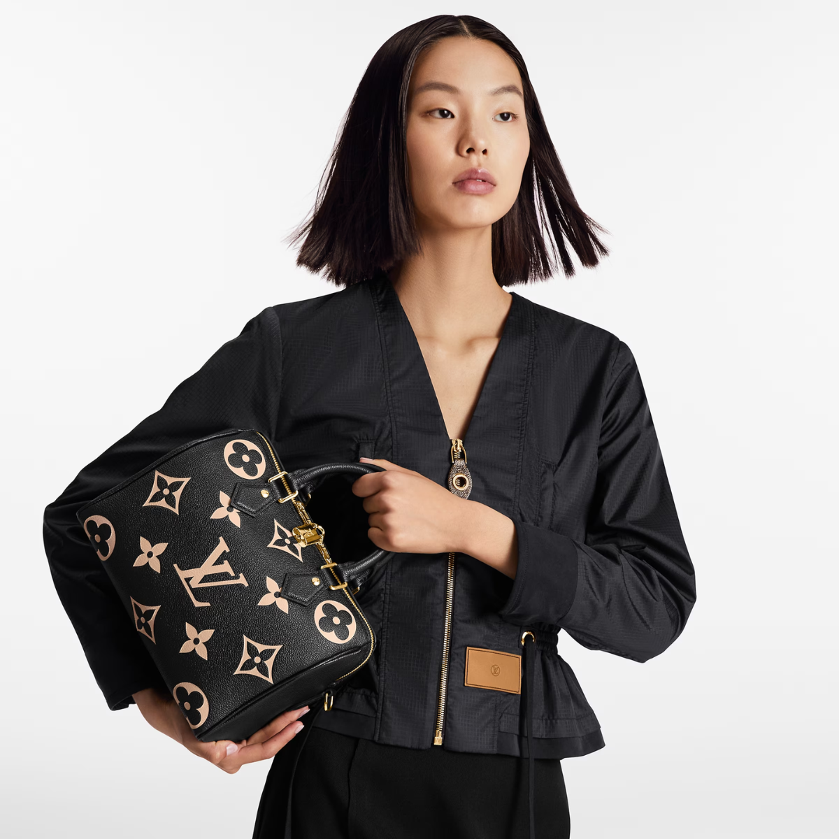 Speedy Bandoulière 25 – this sophisticated handbag was inspired by the House’s “Express” bag from 1930 – LUX VERSE Luxury Designer Fashion Outlet