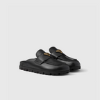 Leather mules – the enameled metal triangle logo embellishes the leather band while the light rubber – LUX VERSE Luxury Designer Fashion Outlet