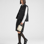 Padded Re-Nylon vest – versatile and functional, the multi-pocket design is enhanced by the enameled metal – LUX VERSE Luxury Designer Fashion Outlet