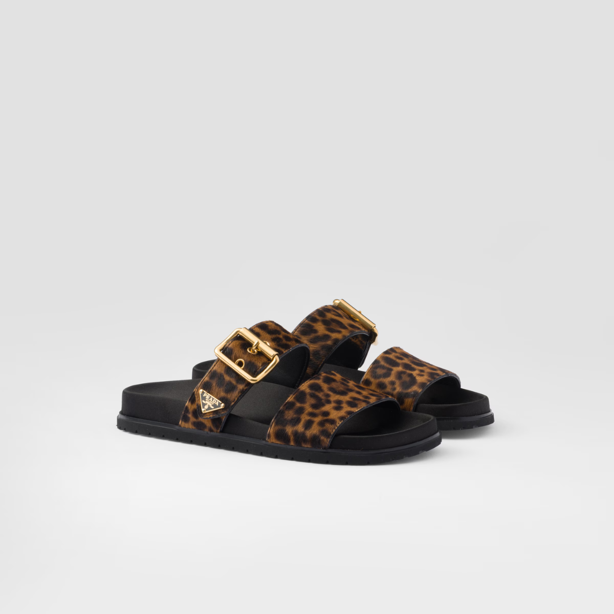Printed leather Leopard Print slides – the footwear defined by metal buckles is completed by comfortable rubber soles – LUX VERSE Luxury Designer Fashion Outlet