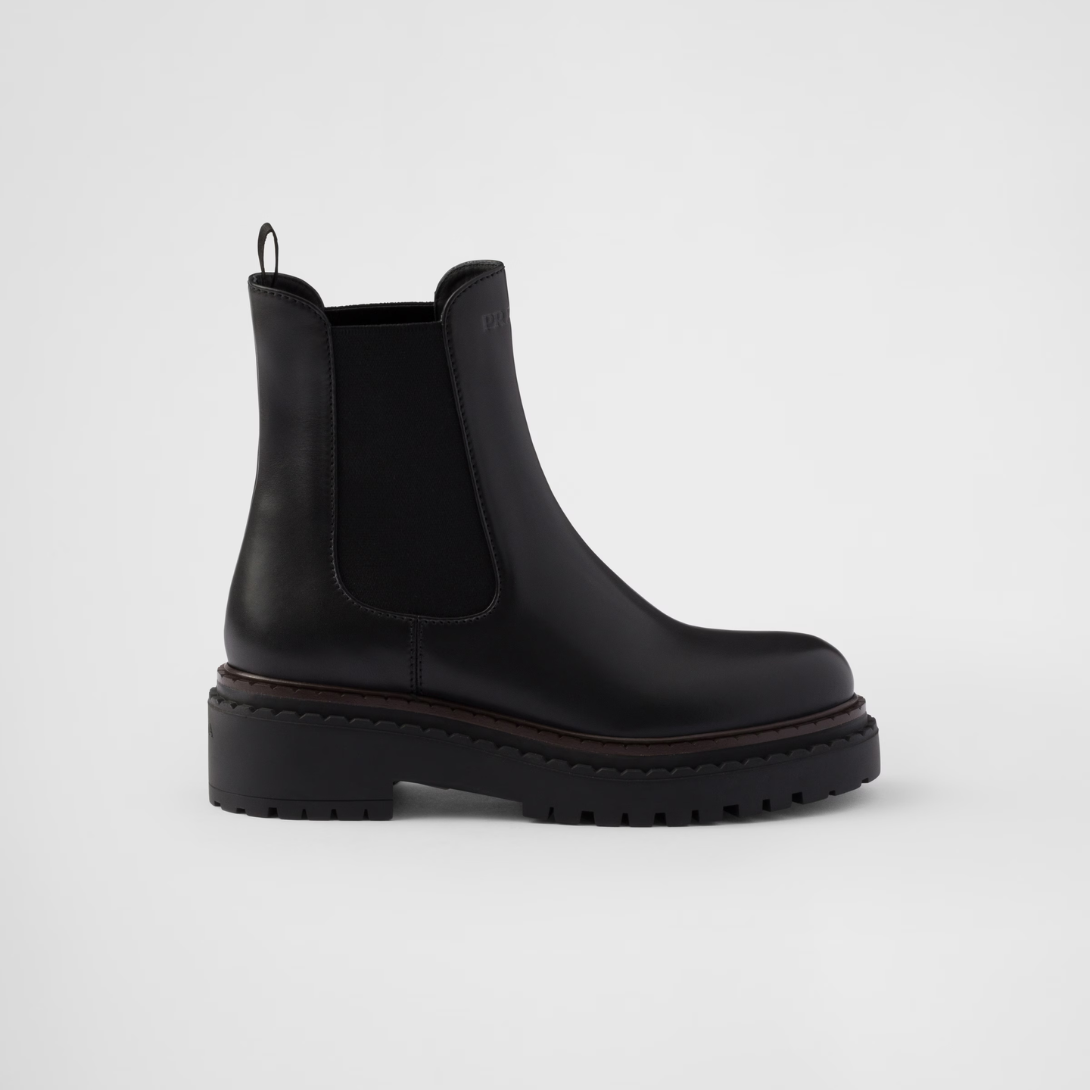 Leather Chelsea boots – a hybrid silhouette blending classic details and contemporary touches defines these – LUX VERSE Luxury Designer Fashion Outlet