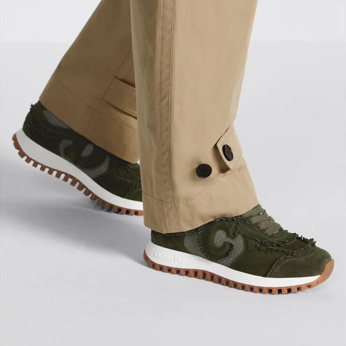 C'est Elevated Sneaker – the pairing of khaki suede calfskin and mesh is enhanced by the letters C and D on – LUX VERSE Luxury Designer Fashion Outlet