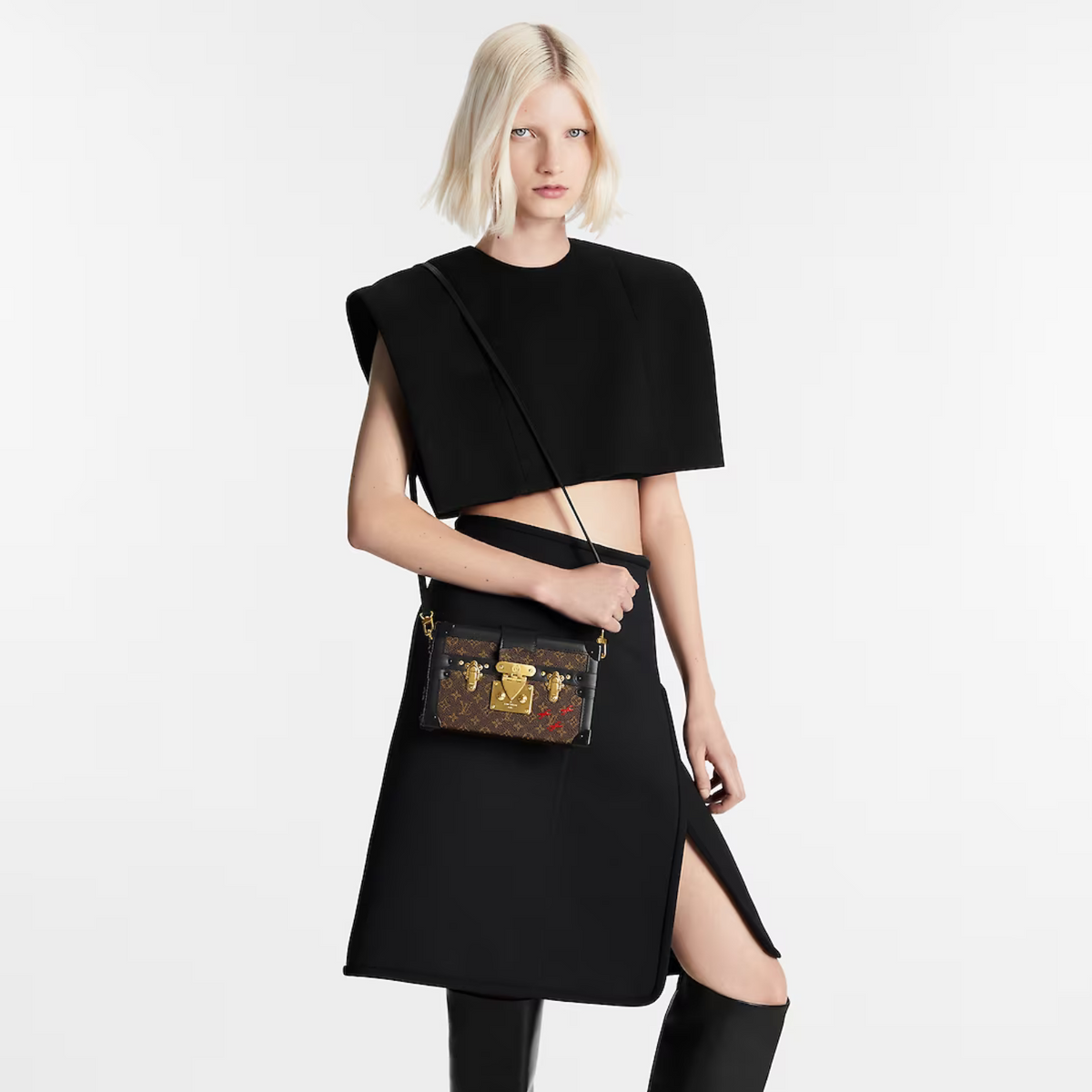 Petite Malle Monogram Canvas – impeccably crafted, with smooth calfskin trim, this covetable “little trunk” travels – LUX VERSE Luxury Designer Fashion Outlet