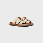 TIPPI SLIDE in SHEARLING AND CALFSKIN – heelSTRAPS EMBELLISHED WITH STUDS AND METAL RINGSTRIOMPHE SIGNATURE METAL – LUX VERSE Luxury Designer Fashion Outlet