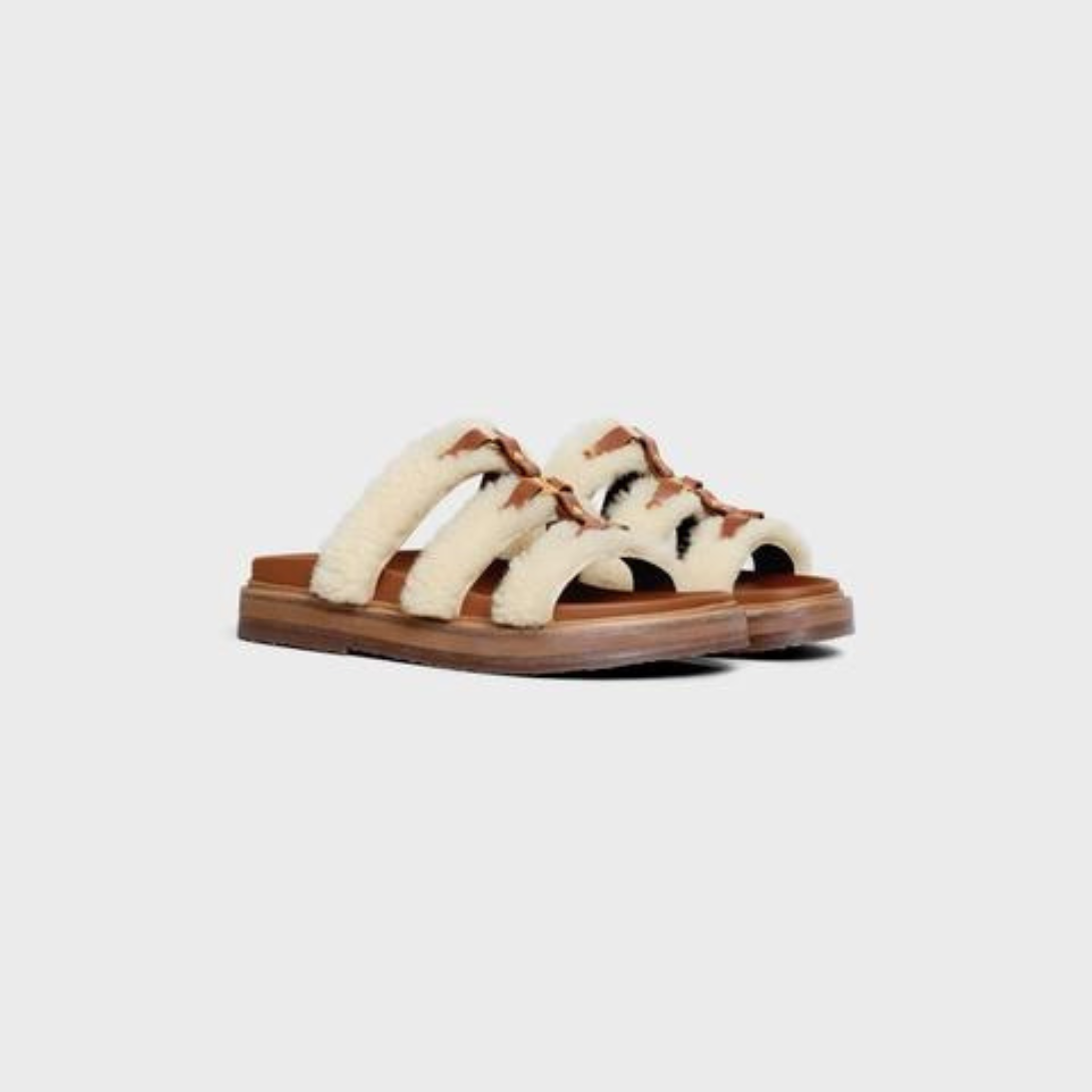 TIPPI SLIDE in SHEARLING AND CALFSKIN – heelSTRAPS EMBELLISHED WITH STUDS AND METAL RINGSTRIOMPHE SIGNATURE METAL – LUX VERSE Luxury Designer Fashion Outlet
