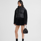 Re-Nylon Down Cropped Jacket – the enameled metal triangle logo completes the modern design with an iconic touch – LUX VERSE Luxury Designer Fashion Outlet