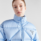 Re-Nylon Gabardine cropped down jacket – the lettering logo is framed by the iconic triangle that is interpreted – LUX VERSE Luxury Designer Fashion Outlet