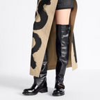 D-Quest Thigh Boot – the black supple calfskin tubular silhouette is elevated by a decorative strap – LUX VERSE Luxury Designer Fashion Outlet