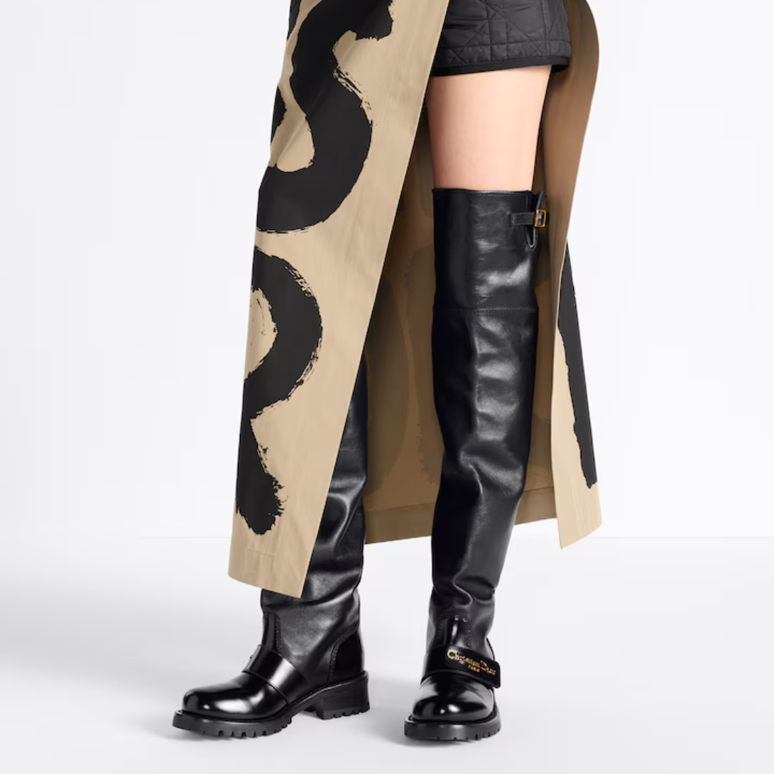 D-Quest Thigh Boot – the black supple calfskin tubular silhouette is elevated by a decorative strap – LUX VERSE Luxury Designer Fashion Outlet