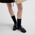 Brushed leather loafers – the style completed with a thin rubber sole is decorated with the iconic enameled – LUX VERSE Luxury Designer Fashion Outlet