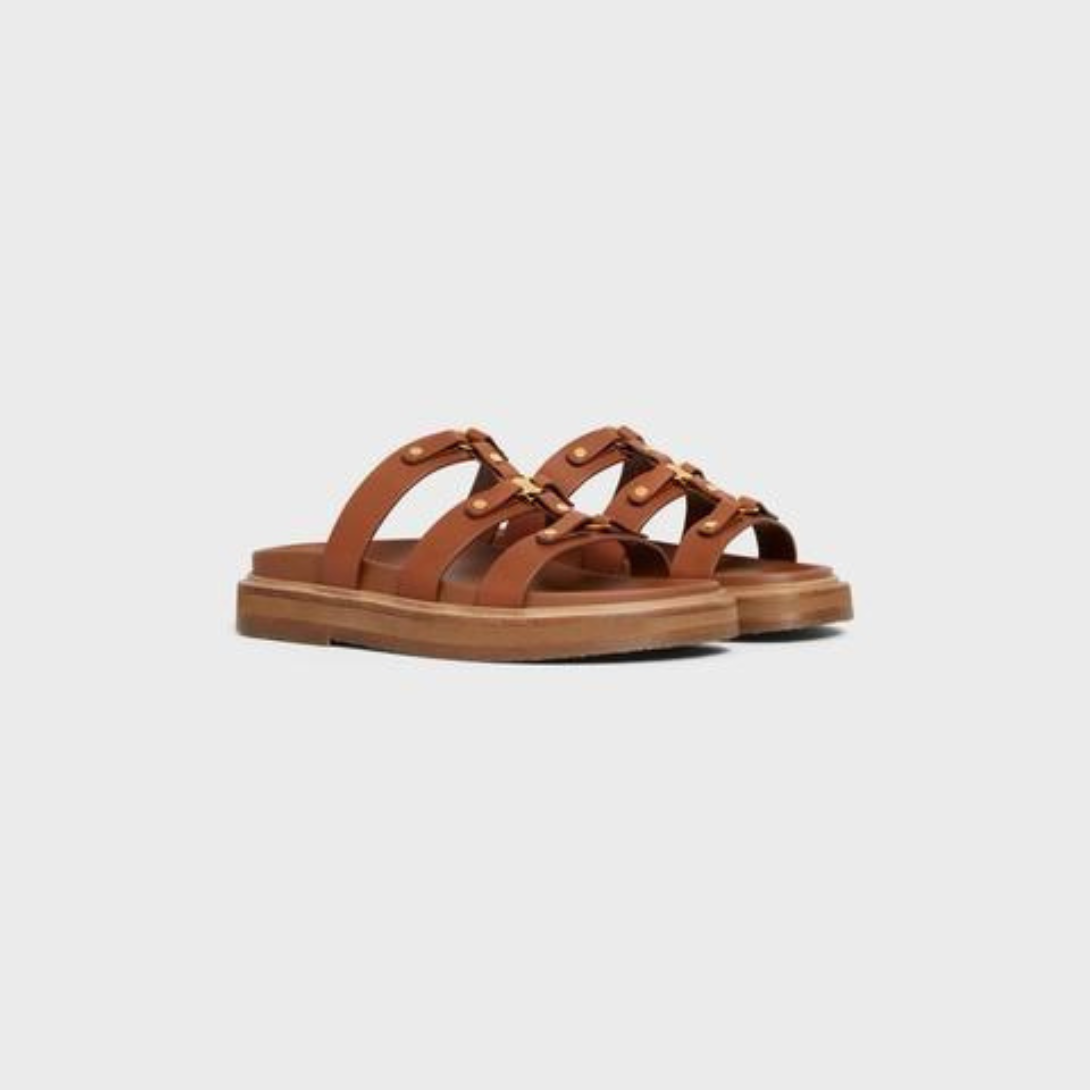 TIPPI SLIDE in CALFSKIN – heelSTRAPS EMBELLISHED WITH STUDS AND METAL RINGSTRIOMPHE SIGNATURE METAL – LUX VERSE Luxury Designer Fashion Outlet