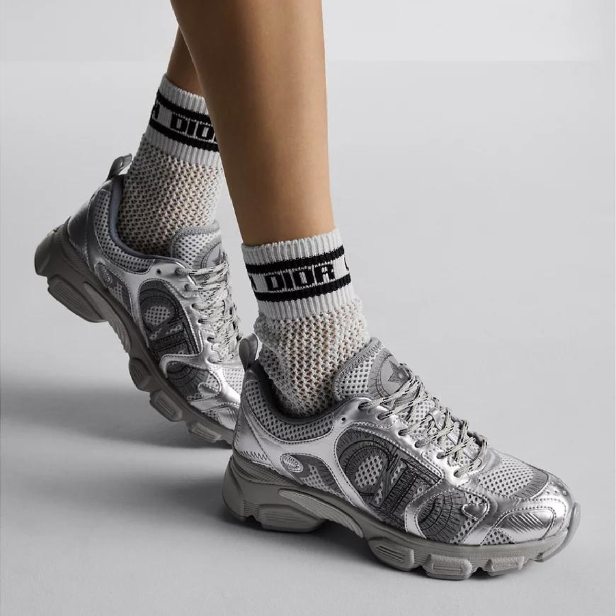 Chrono Sneaker Silver-Tone – pairing gray mesh with silver-tone laminated leather-effect panels, it is accented – LUX VERSE Luxury Designer Fashion Outlet