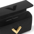 Twist MM Black Handbag – the sliding chain strap can be doubled for shoulder carry or lengthened for – LUX VERSE Luxury Designer Fashion Outlet