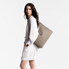 CarryAll MM Tourterelle Gray – crafted from Monogram Empreinte, the Maison’s supple embossed leather, the CarryAll – LUX VERSE Luxury Designer Fashion Outlet