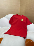 Rotes Kurzarmshirt aus Baumwolle mit goldenem Logo – Herren