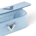 Twist West Candy Blue – with its elegant, elongated shape, the Twist West handbag offers a cool new – LUX VERSE Luxury Designer Fashion Outlet