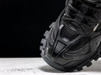 Track All Black Sneakers