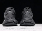 Track All Black Sneakers