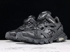 Track All Black Sneakers