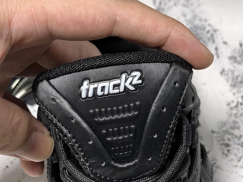 Track All Black Sneakers