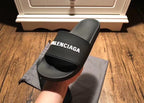 Schwarze Logo-Badeschlappen