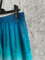 Türkisfarbene Seidenshorts mit Farbverlauf – Herren