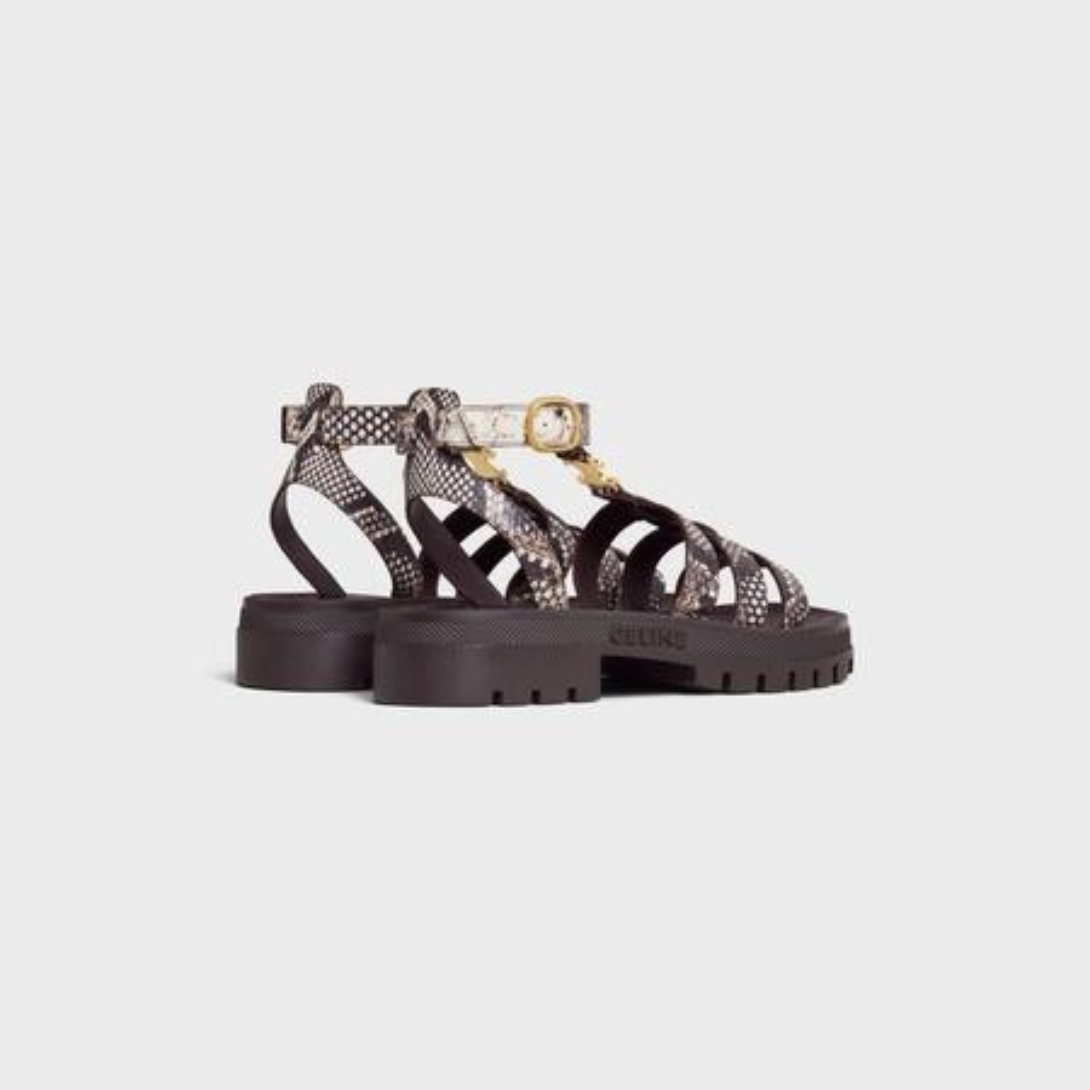 CLEA TRIOMPHE GLADIATOR SANDAL in Python Stamped Goatskin – 100% Goatskin100% Calfskin Lining1.6 IN (40 MM) heelTRIOMPHE METAL PIECE – LUX VERSE Luxury Designer Fashion Outlet