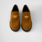 Suede loafers Cognac Leather – upper with a suede band Enameled metal triangle logo Monoblock rubber sole – LUX VERSE Luxury Designer Fashion Outlet