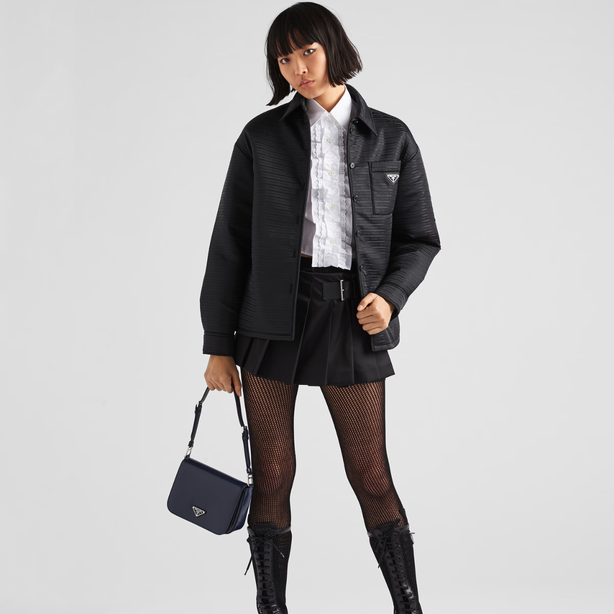 Re-Nylon Style Jacket – lined Shirt collar Long sleeves Side slits Buttoned cuffs Button closure Patch – LUX VERSE Luxury Designer Fashion Outlet