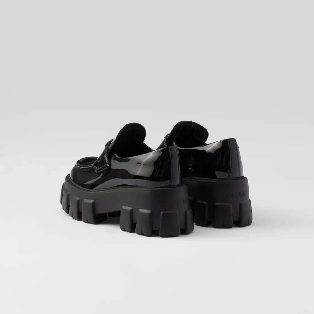 Monolith patent leather loafers – these bold, original loafers stand out for their hybrid design emphasized by – LUX VERSE Luxury Designer Fashion Outlet