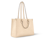 OnTheGo MM Creme – the roomy interior can easily fit a laptop while rolled-leather top handles and two – LUX VERSE Luxury Designer Fashion Outlet
