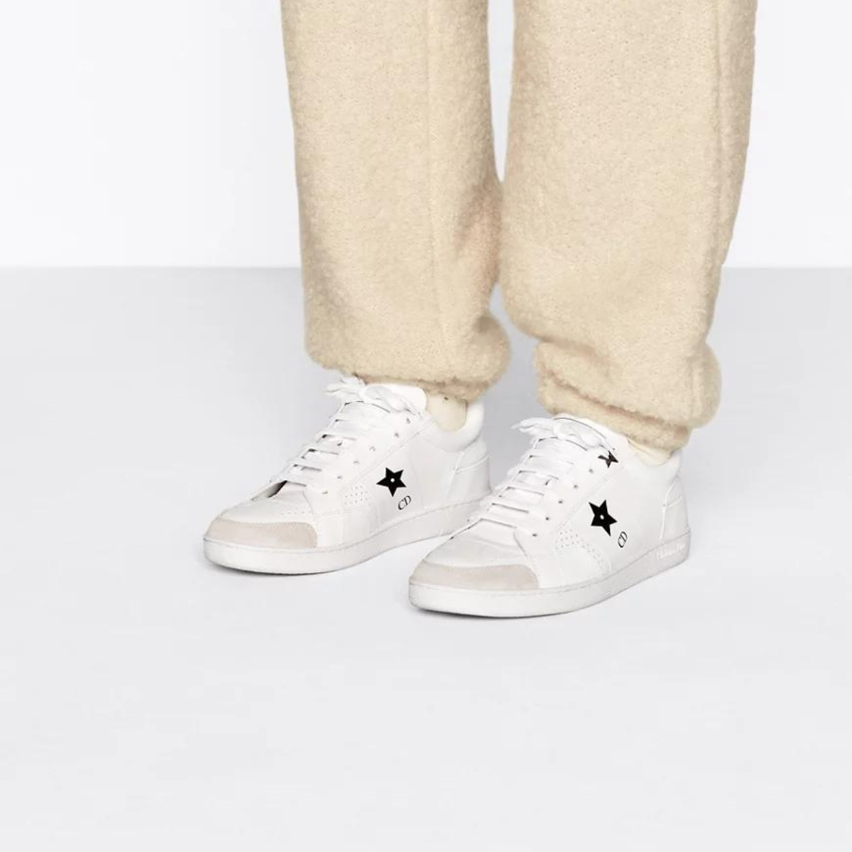Star Sneaker – crafted in white calfskin, it is embellished with a tonal suede insert on the front – LUX VERSE Luxury Designer Fashion Outlet