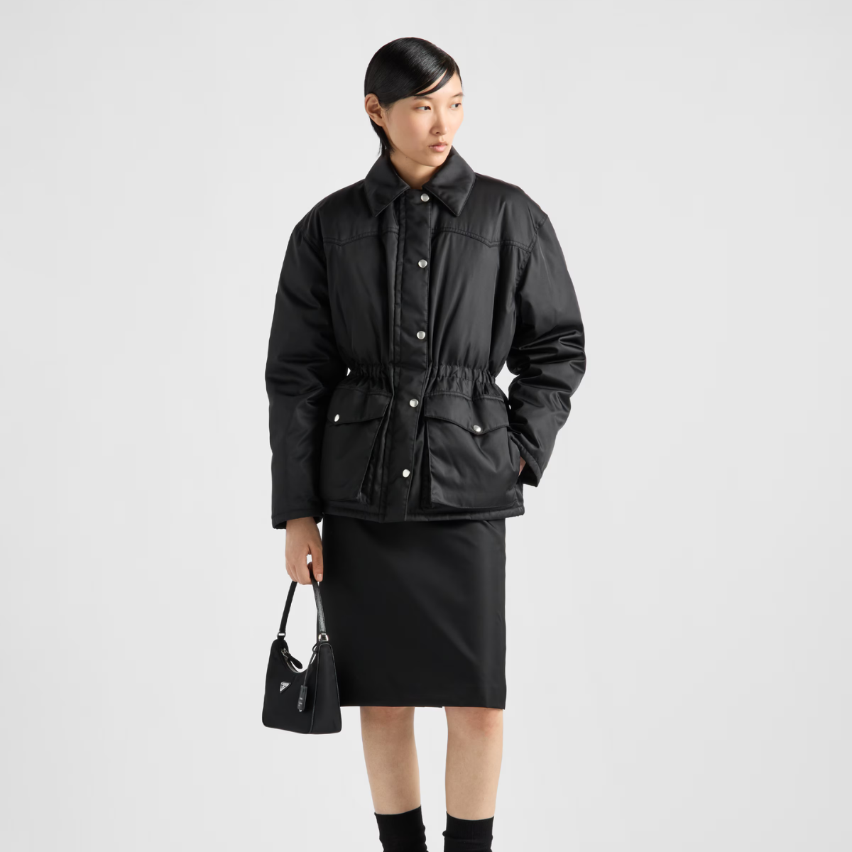 Re-Nylon down fashion jacket – soft, enveloping volumes create the silhouette of this Re-Nylon down jacket, – LUX VERSE Luxury Designer Fashion Outlet