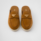 Suede Leathers Sabots – upper with leather band Apron with pinched stitch seam Leather lining Enameled metal – LUX VERSE Luxury Designer Fashion Outlet