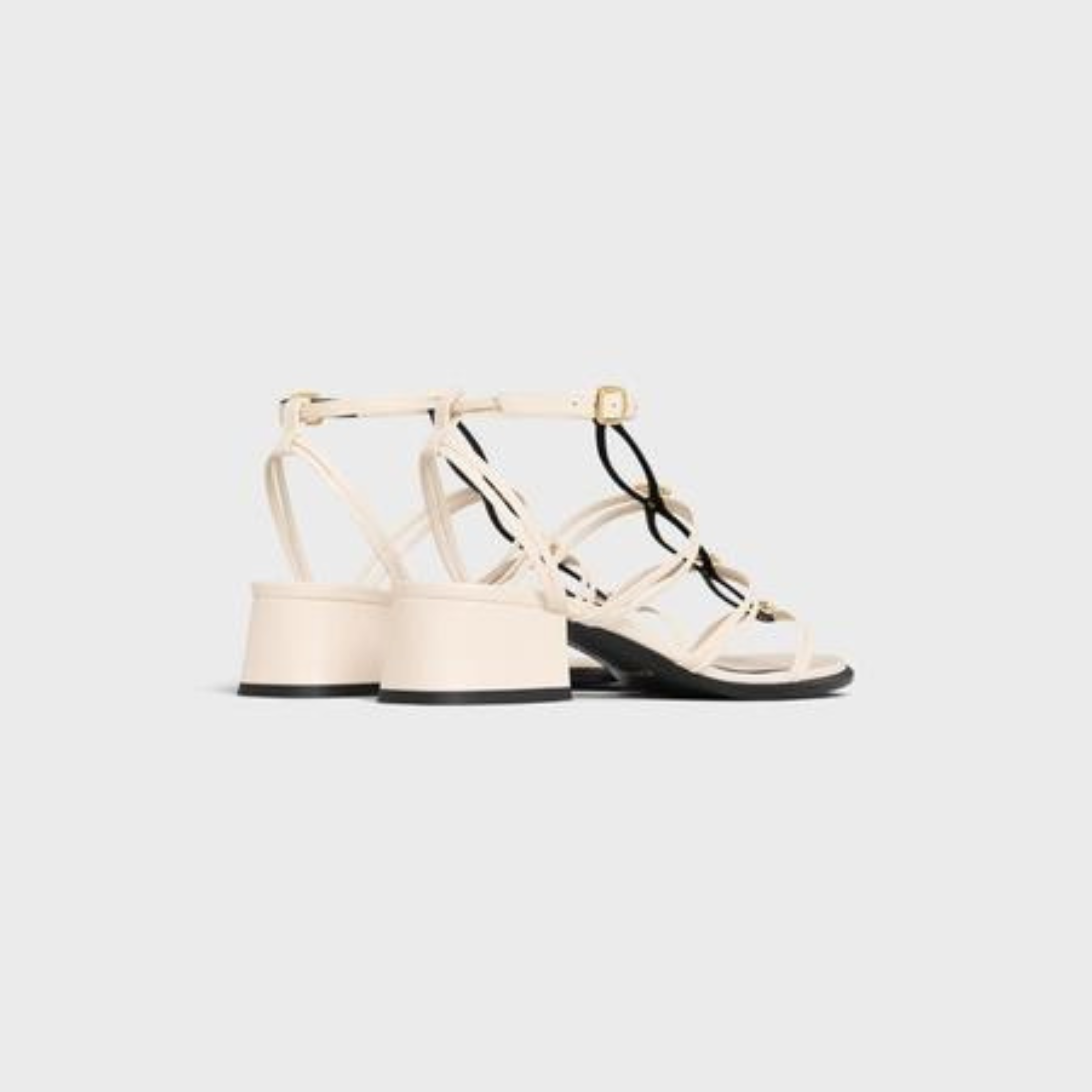 CLEMENCE MULTI TRIOMPHE SANDAL in LAMBSKIN – 100% LAMBSKIN100% Goatskin Linning1.6 IN (40 MM) heelWIDE SQUARED HEELALMOND – LUX VERSE Luxury Designer Fashion Outlet