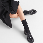 patent leather loafers – the triangle logo, first introduced on trunks designed by Mario, decorates the front – LUX VERSE Luxury Designer Fashion Outlet