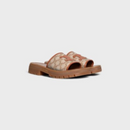 TRIOMPHE SLIDE in TRIOMPHE STAMPED CANVAS & CALFSKIN – lEATHER PATCHSIGNATURE EMBOSSED ON THE EXTERNAL SIDE OF THE OUTSOLESIGNATURE – LUX VERSE Luxury Designer Fashion Outlet
