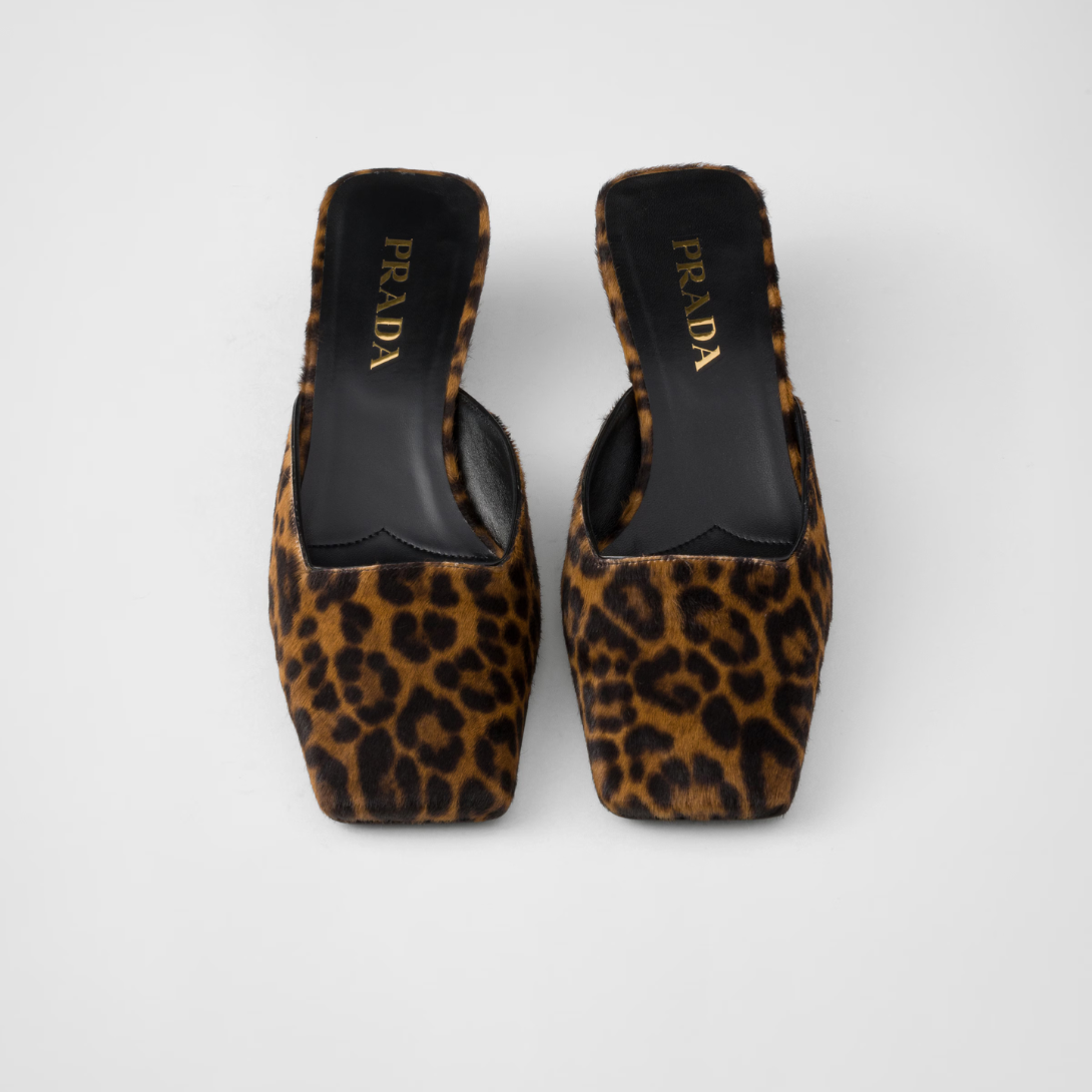 Printed leather slides – the essential, iconic geometric shape of triangle inspires the design of the heel – LUX VERSE Luxury Designer Fashion Outlet